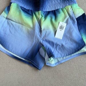 Pair of Gradient blue shorts and solid light blue shirts - girls size medium -8